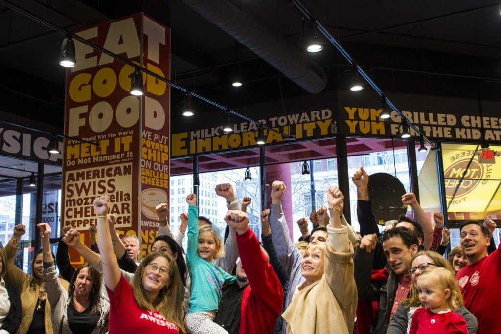 Tom & Chee grilled cheese franchise fans in the store