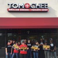 Tom & Chee franchise with workers