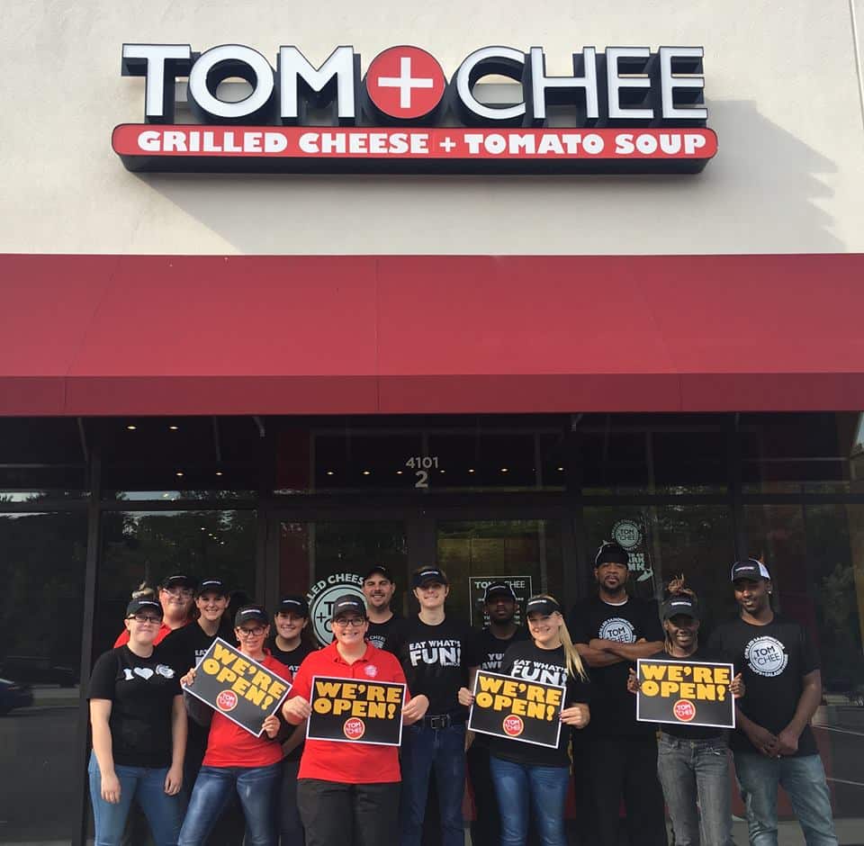 Tom & Chee grilled cheese franchise with workers